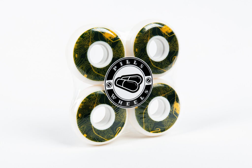 White PU Wheels with Abstract Green and Yellow Trippy Graphics and Pills Logo Sticker