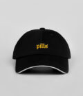 black cap with yellow blackletter embroidery front view